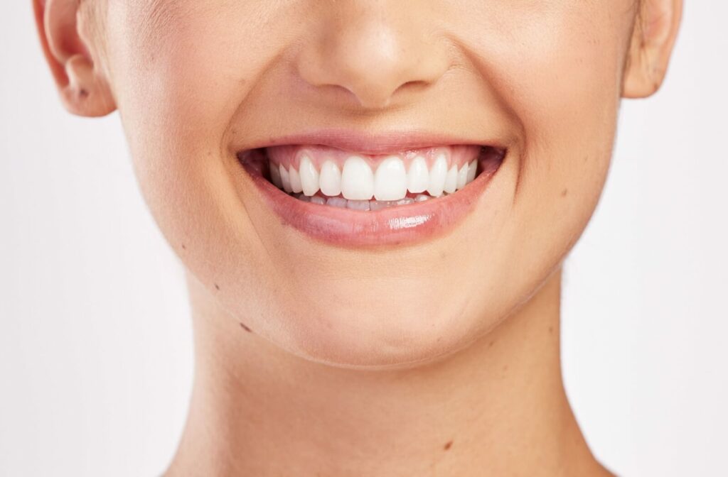 A close-up image of a patient's bright teeth after a dental cleaning.